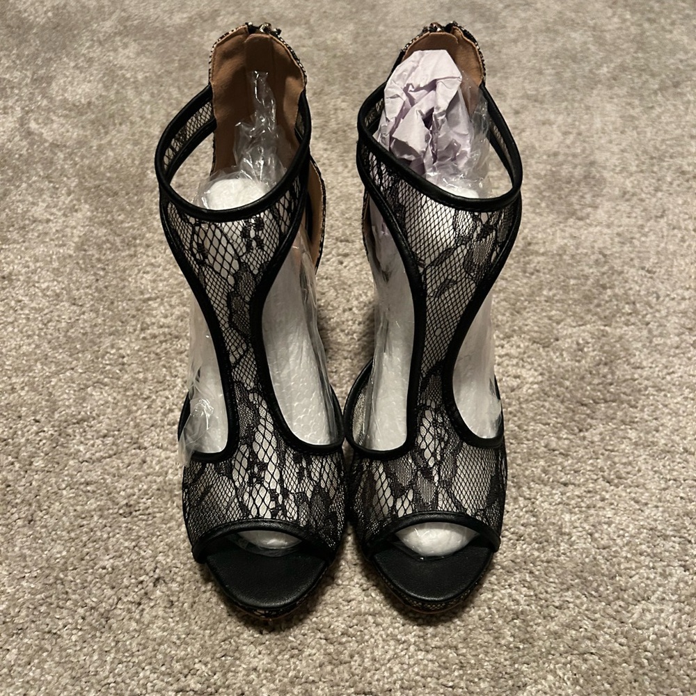 Jolimall Black Lace T strap open toe stiletto with back zipper.